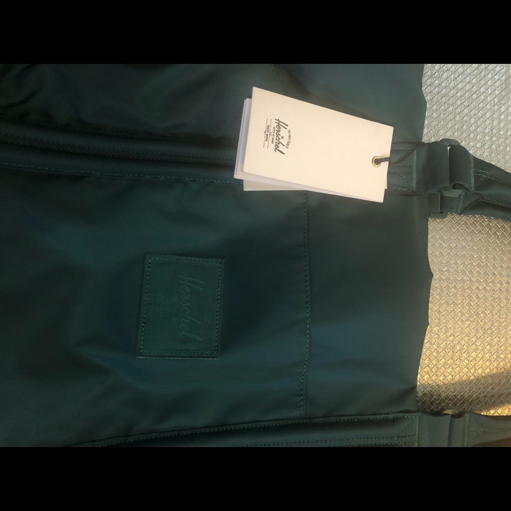 Brand new teal Herschel bag 18” x 12”